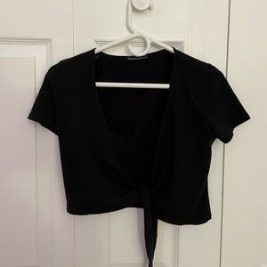 One size black cross top from Brandy Melville